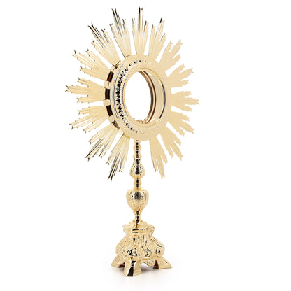 Ostensorio barocco per Ostia Magna in ottone e bronzo dorato. Dimensioni 43x64 cm