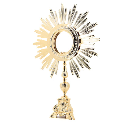Ostensorio barocco per Ostia Magna in ottone e bronzo dorato. Dimensioni 43x64 cm
