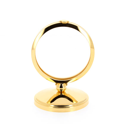 Teca da esposizione in ottone dorato su base semplice. Dimensioni h. 11 e diametro 8 cm