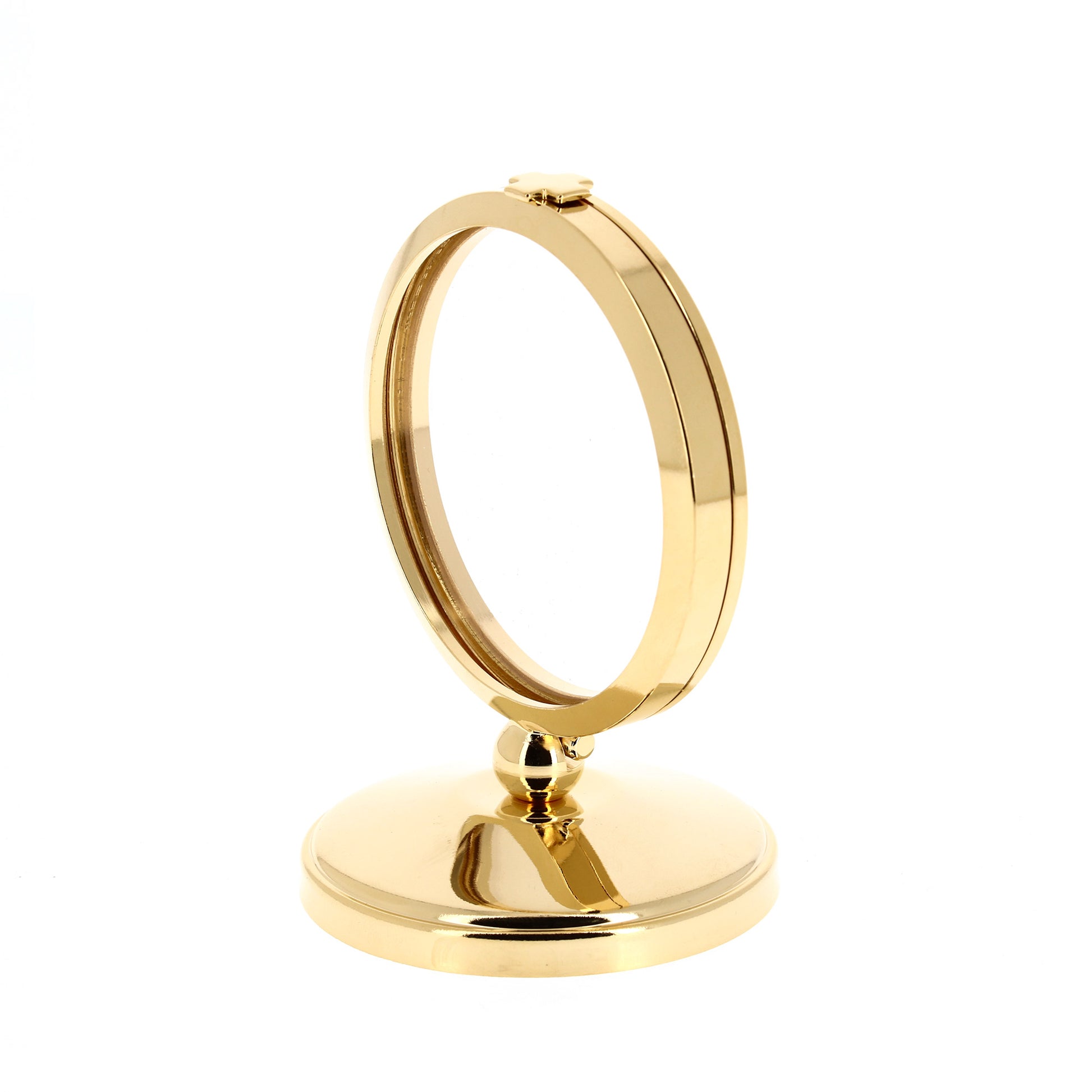 Teca da esposizione in ottone dorato su base semplice. Dimensioni h. 11 e diametro 8 cm