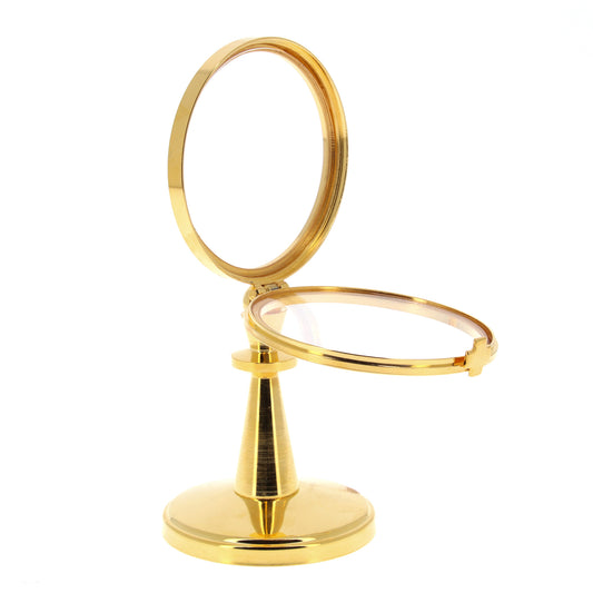 Teca da esposizione su stelo in ottone dorato. Dimensioni h. 16,5 cm e diametro 8 cm