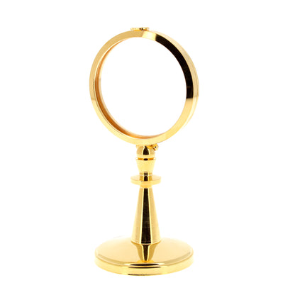 Teca da esposizione su stelo in ottone dorato. Dimensioni h. 16,5 cm e diametro 8 cm
