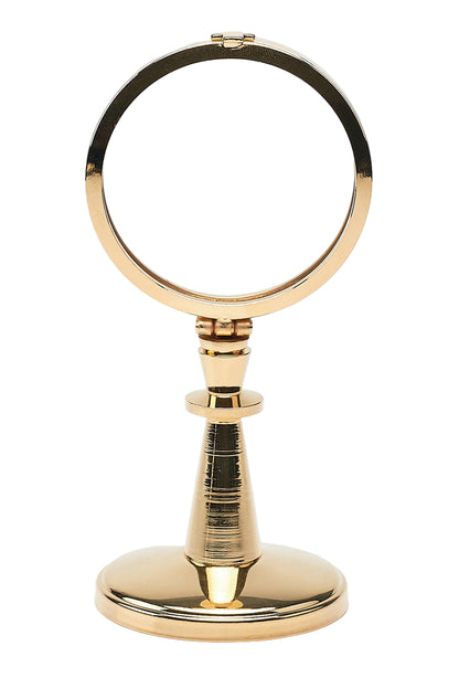 Teca da esposizione su stelo in ottone dorato. Dimensioni h. 16,5 cm e diametro 8 cm