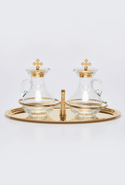 Servizio ampolle su vassoio dorato con anelli di tenuta, dimensioni 23x14 cm. Capienza ampolle 100 cc
