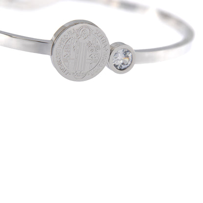 Bracciale rigido in acciaio medaglia san Benedetto e strass. Dimensioni 6,5x5 cm