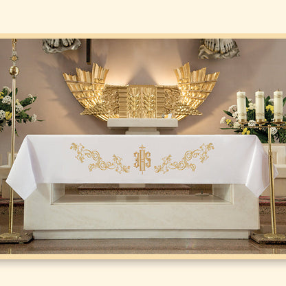 Tovaglia da altare, in poliestere, con ricamo dorato simbolo JHS. Dimensioni 165x300 cm