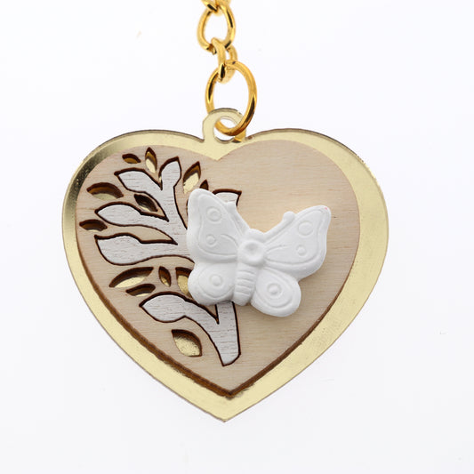 Ricordino Matrimonio - portachiavi cuore in plexiglass color oro farfalla. Altezza 4 cm