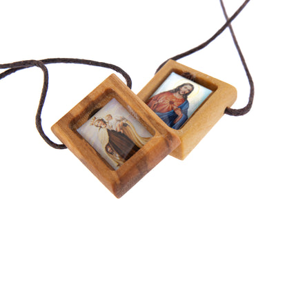 Scapolare in legno d'ulivo. Lunghezza 51 cm