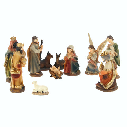 Set presepe composto da 11 soggetti, in resina. Altezza 9 cm