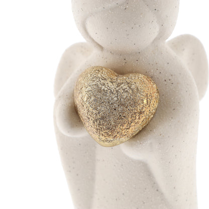 Statua Angelo in porcellana con cuore oro. Altezza 11,3 cm
