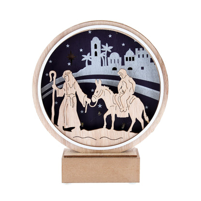 Cerchio su base in legno con rappresentazione di Giuseppe e Maria con asino. Con luce. Altezza 20 cm