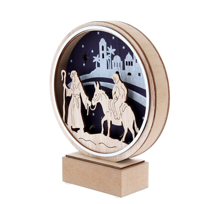 Cerchio su base in legno con rappresentazione di Giuseppe e Maria con asino. Con luce. Altezza 20 cm