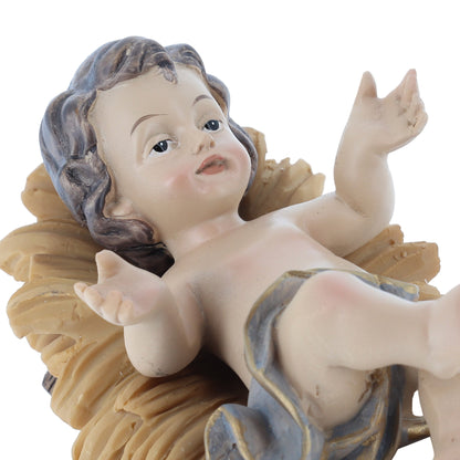 Gesù Bambino in resina su mangiatoia. Altezza 11,5 cm