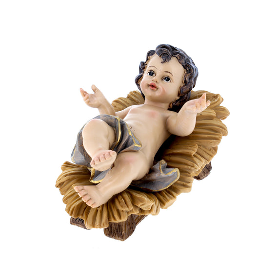 Gesù Bambino in resina su mangiatoia. Altezza 16 cm