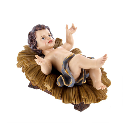 Gesù Bambino in resina su mangiatoia. Altezza 33 cm