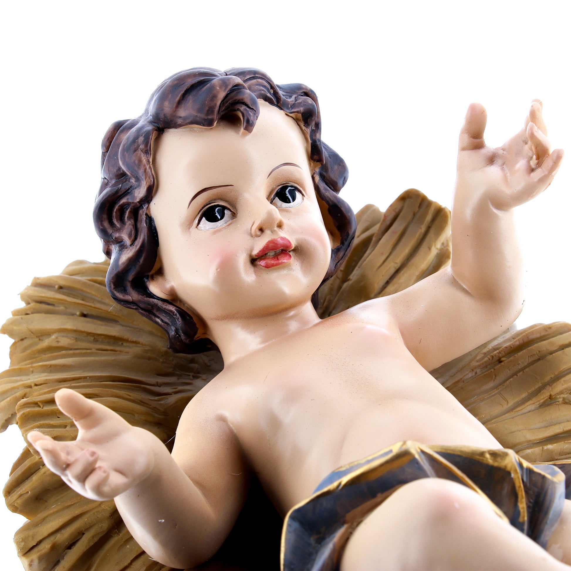 Gesù Bambino in resina su mangiatoia. Altezza 26 cm