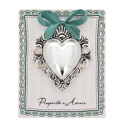 Cuore Votivo in resina argentata. Dimensioni 14x17,5 cm