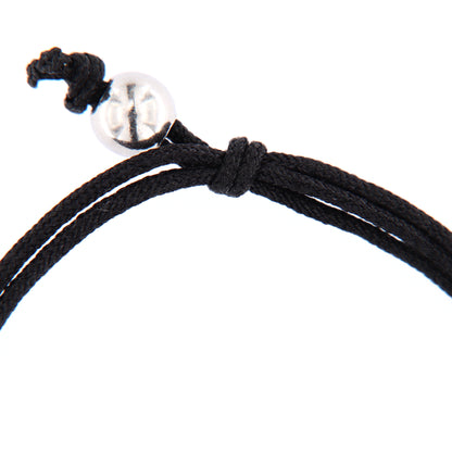 Bracciale Felix in corda colorata con elemento inciso in argento 925