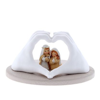 Sacra Famiglia in resina. Altezza 6 cm