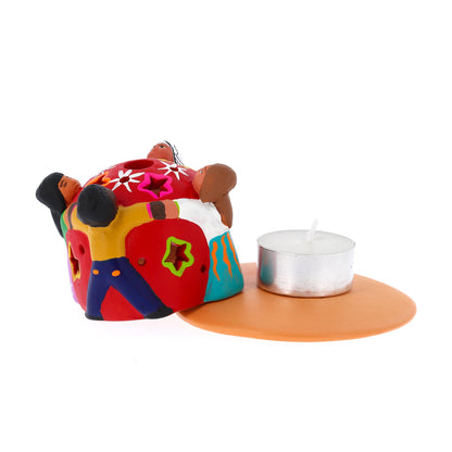 Porta lumino in terracotta con girotondo di bambini. Dimensioni 5x6 cm