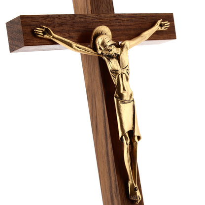 Crocifisso in legno noce, corpo con aureola in metallo dorato. Altezza 21 cm