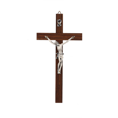 Crocifisso in legno noce, corpo in metallo. Altezza 21 cm