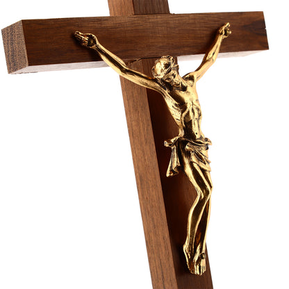 Crocifisso in legno noce, corpo in metallo. Altezza 21 cm