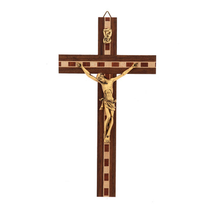 Crocifisso in legno con inserti in legno decorati, con corpo in metallo dorato. Altezza 21 cm