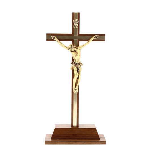 Crocifisso in legno noce con inserti e corpo in metallo dorato. Altezza 25 cm