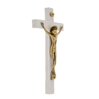 Crocifisso in legno con corpo in resina bronzata. Altezza 23 cm