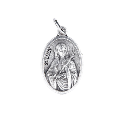 Medaglia Santa Lucia e retro croce, in zama. Altezza 2,2 cm