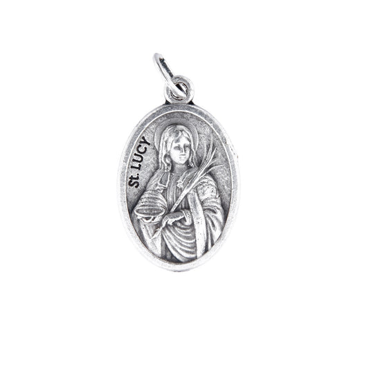 Medaglia Santa Lucia e retro croce, in zama. Altezza 2,2 cm