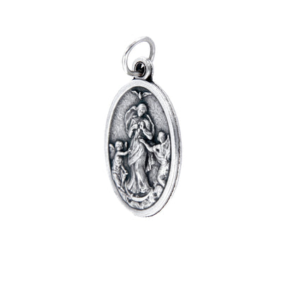 Medaglia Maria che scioglie i nodi e retro croce, in zama. Altezza 2,2 cm