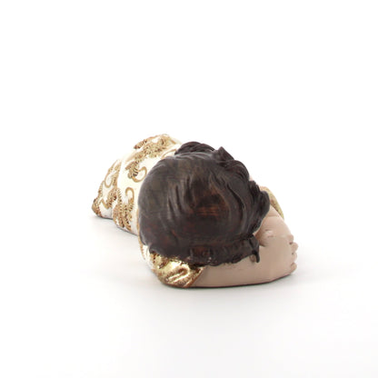 Statua Gesù Bambino dormiente in resina. Larghezza 31,8 cm