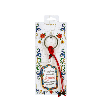Keychain with phrase - If we truly want to Love, we must learn to forgive