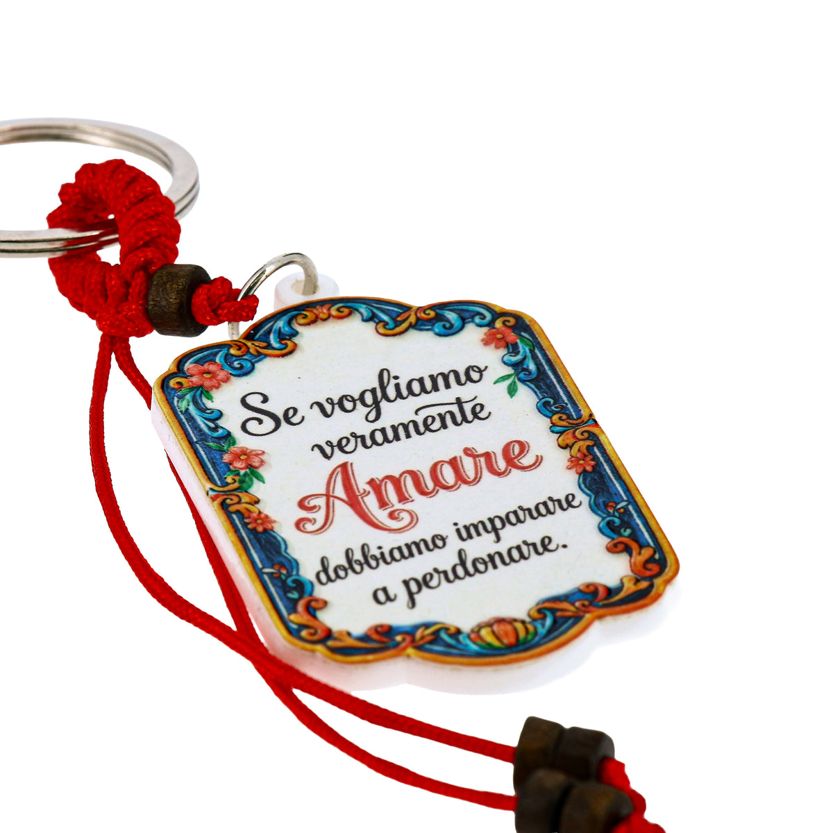 Keychain with phrase - If we truly want to Love, we must learn to forgive
