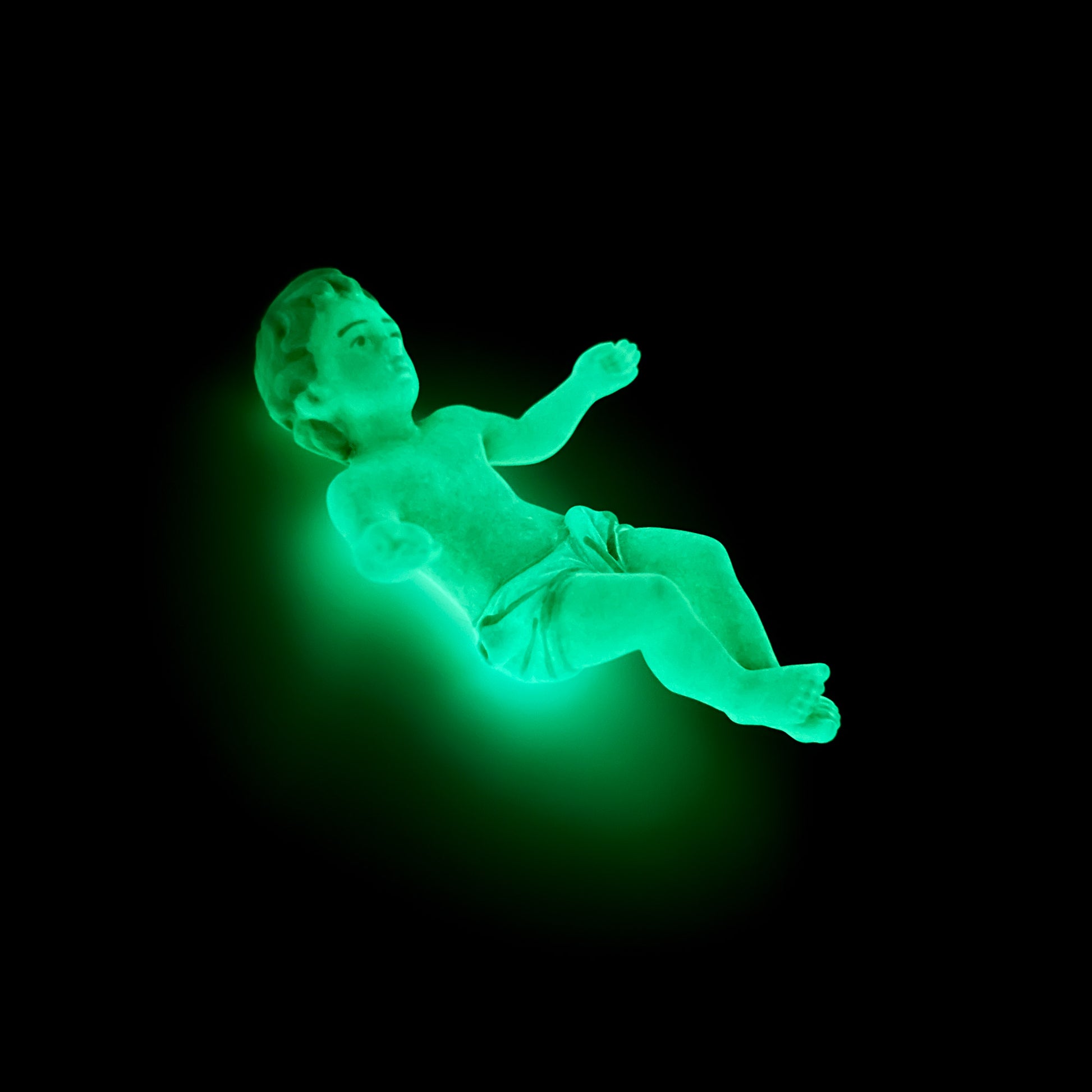Statua Gesù Bambino in resina decorata, fluorescente al buio. Altezza 5 cm