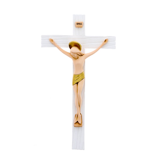 Crocifisso in legno con corpo in resina colorata. Altezza 23 cm