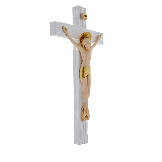 Crocifisso in legno con corpo in resina colorata. Altezza 23 cm