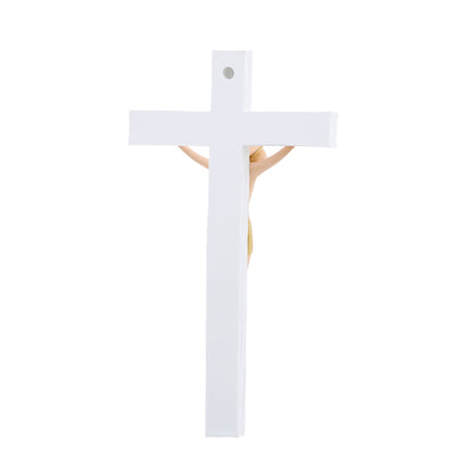 Crocifisso in legno con corpo in resina colorata. Altezza 23 cm