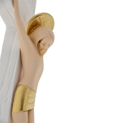 Crocifisso in legno con corpo in resina colorata. Altezza 23 cm