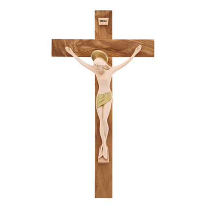 Crocifisso in legno d'ulivo con corpo in resina. Altezza 23,5 cm