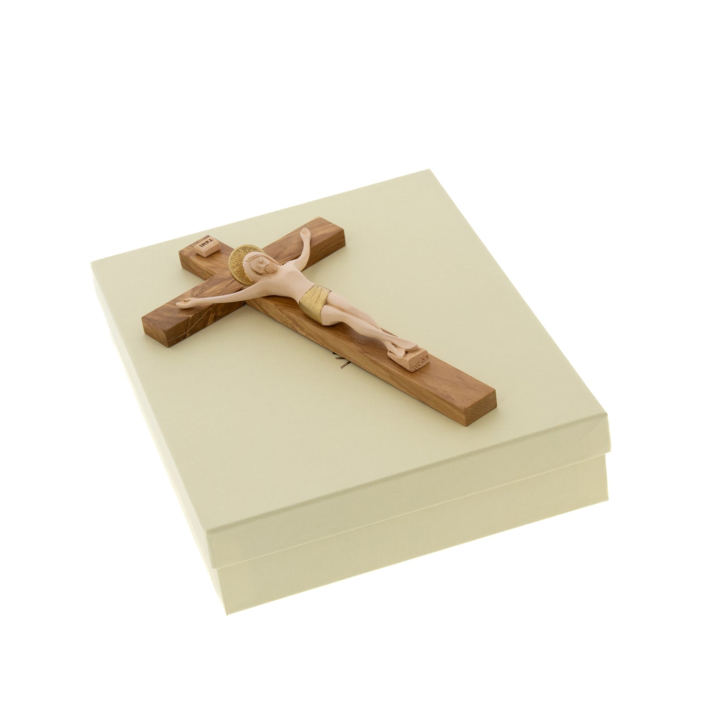 Crocifisso in legno d'ulivo con corpo in resina. Altezza 23,5 cm