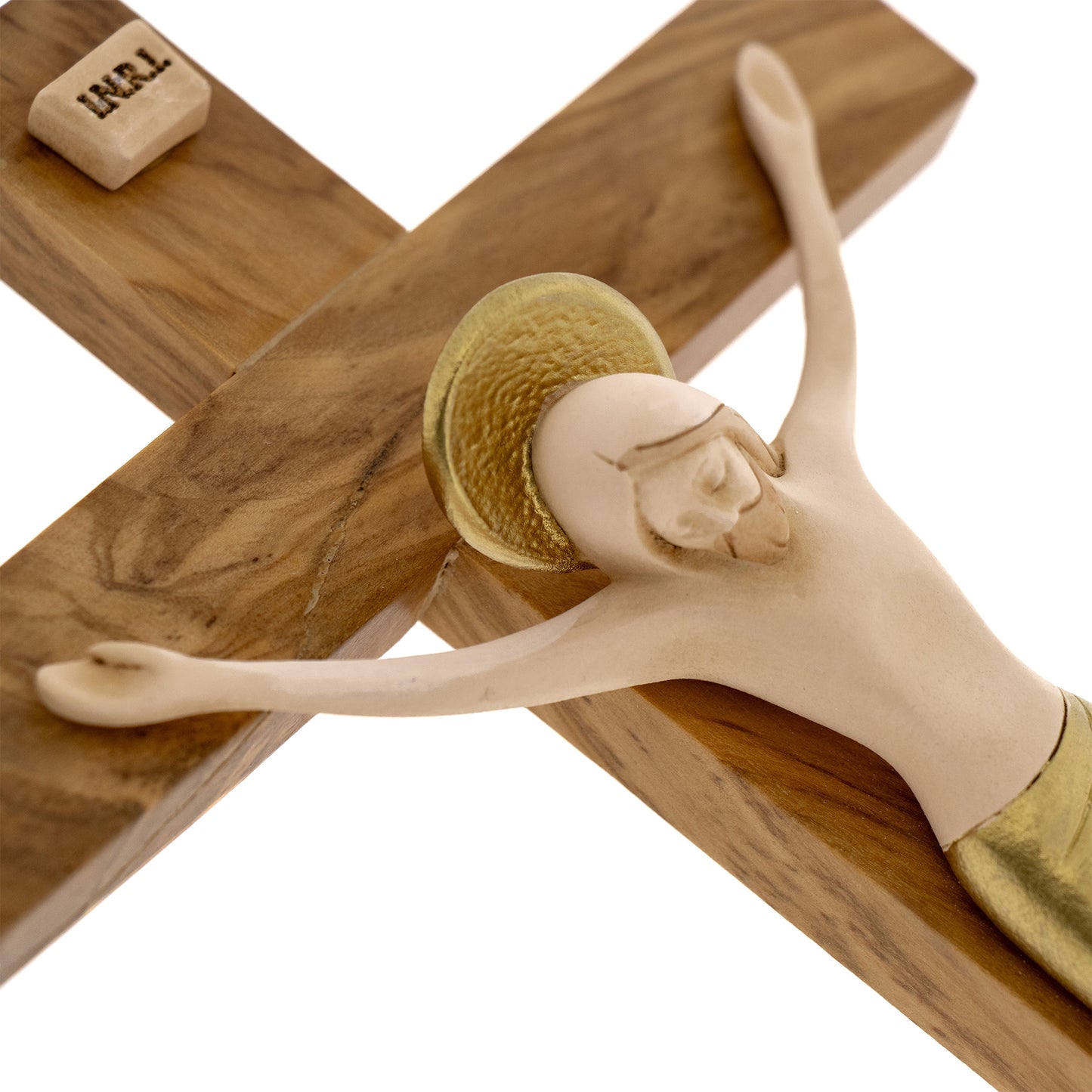 Crocifisso in legno d'ulivo con corpo in resina. Altezza 23,5 cm