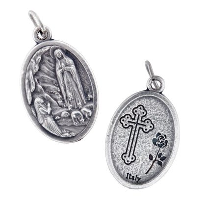 Medaglia Madonna di Lourdes in zama. Altezza 2,2 cm