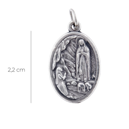 Medaglia Madonna di Lourdes in zama. Altezza 2,2 cm
