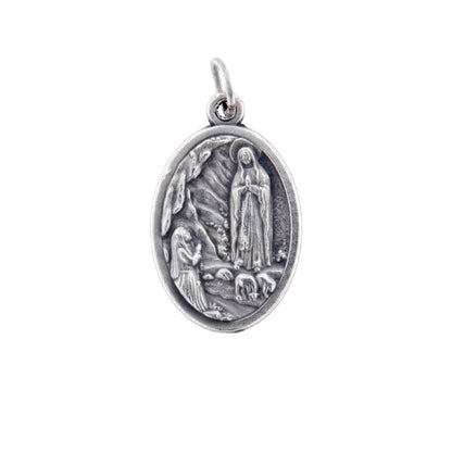 Medaglia Madonna di Lourdes in zama. Altezza 2,2 cm