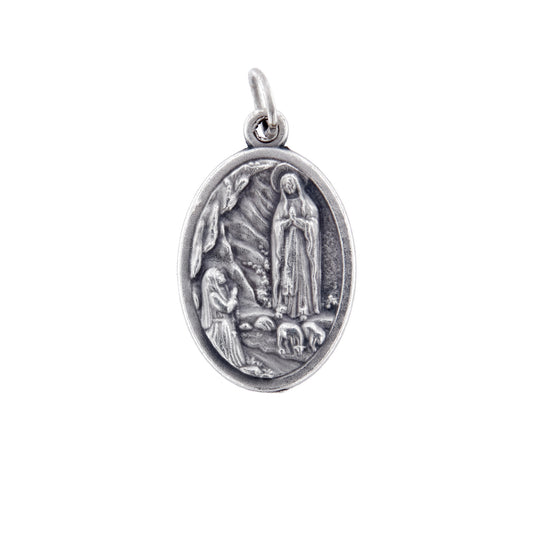 Medaglia Madonna di Lourdes in zama. Altezza 2,2 cm