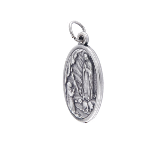 Medaglia Madonna di Lourdes in zama. Altezza 2,2 cm