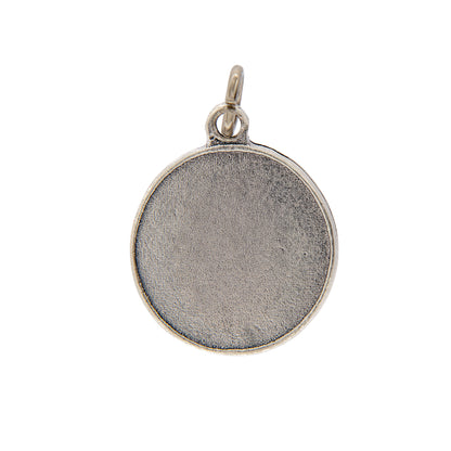 Medaglia San Michele, in zama smaltata. Diametro 1,8 cm